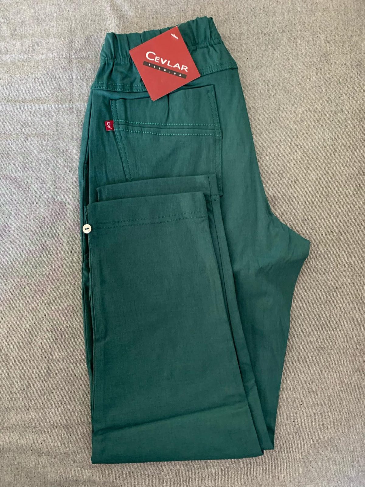 Spodnie z guziczkami kolor malachit rozmiar 48